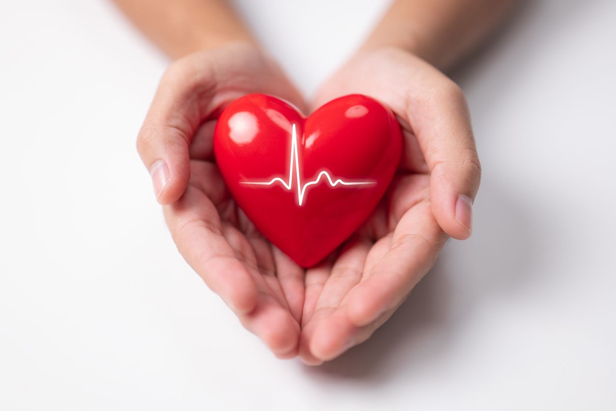 Foundation Repair Heart Surgery | Piermagic® Hands Holding a Heart Symbol, Representing Olympic Foundation Repair's Commitment to Customer Care, Trust, and Lasting Home Protection | Piermagic®