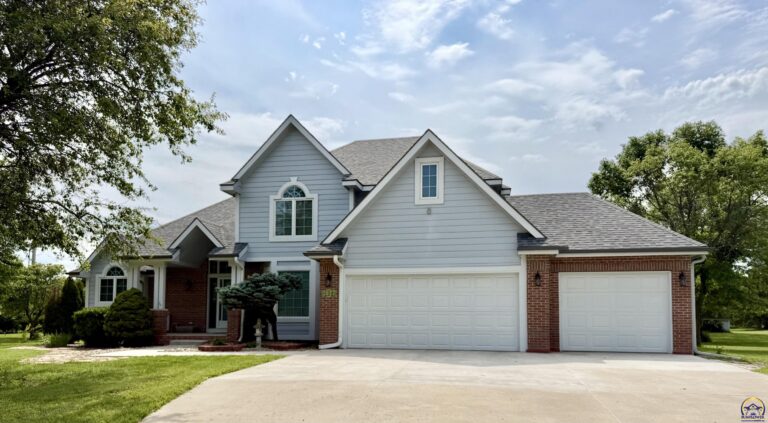 Residential Home in Topeka, Kansas with a Well-maintained Foundation and Landscaped Yard | Piermagic®